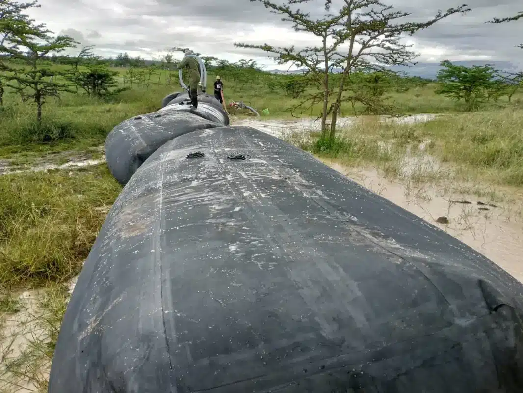 SLAMDAM flood barrier on wet grassland in Laikipia, Kenya